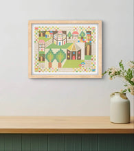 Load image into Gallery viewer, David Wien archival print of Middle East Peace stylistic painting with neutral colors in a folk art style in a bright room with a light frame above a green couch or console table
