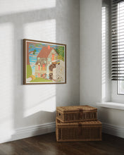 Load image into Gallery viewer, David Wien stone house painting with a dark wood frame in a grey and cool interior with whicker baskets in the corner

